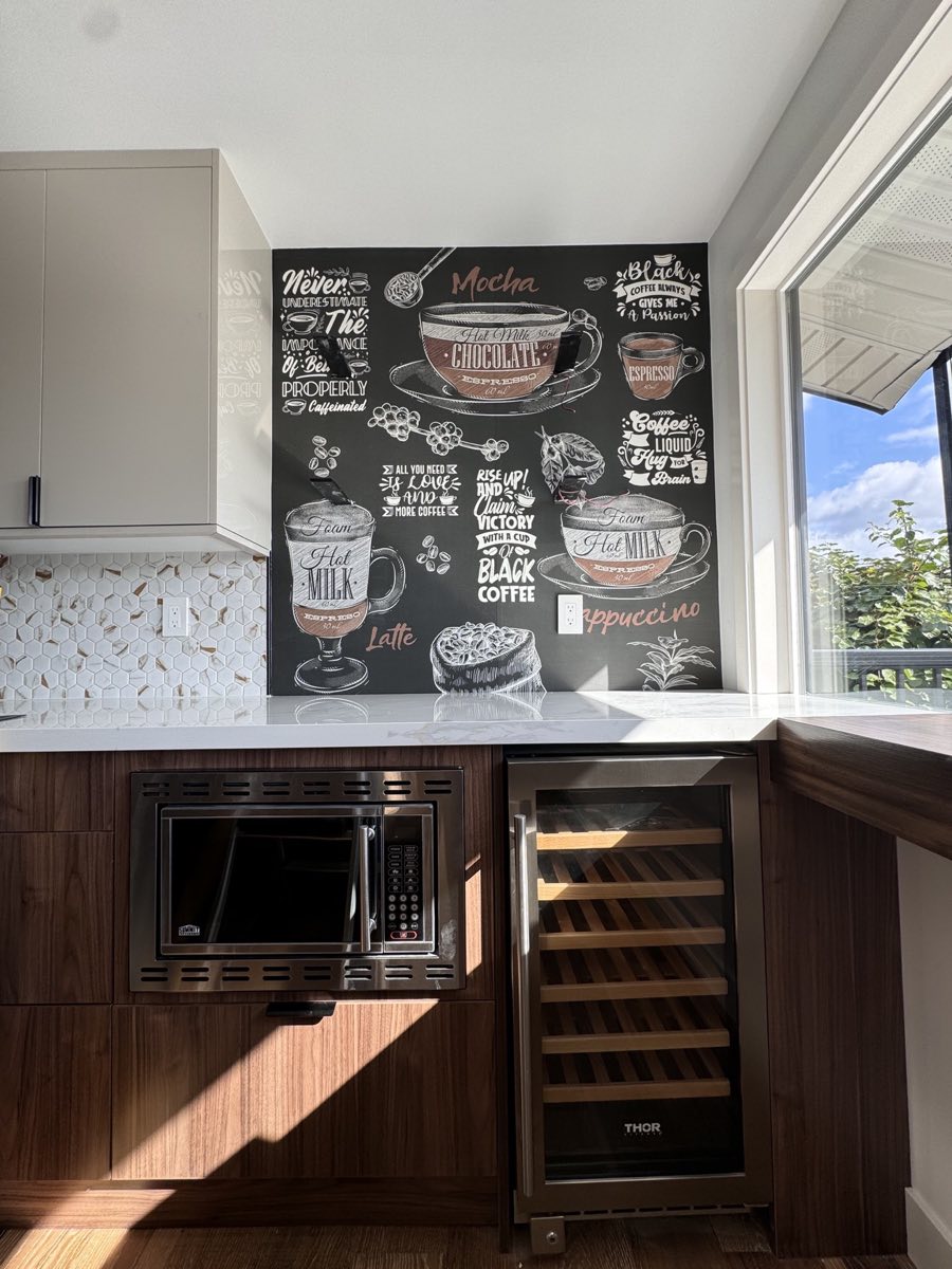 Coffee mural installed above a kitchen counter and wine refrigerator
